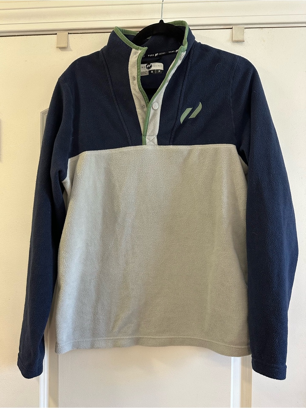 Pure Hockey gray and navy fleece pullover with 1/4 snap placket